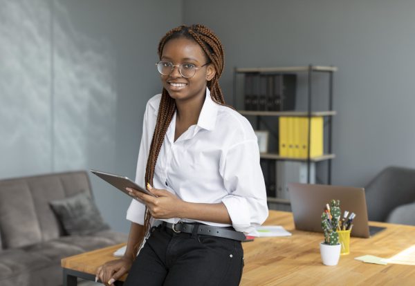 young-woman-holding-tablet-work