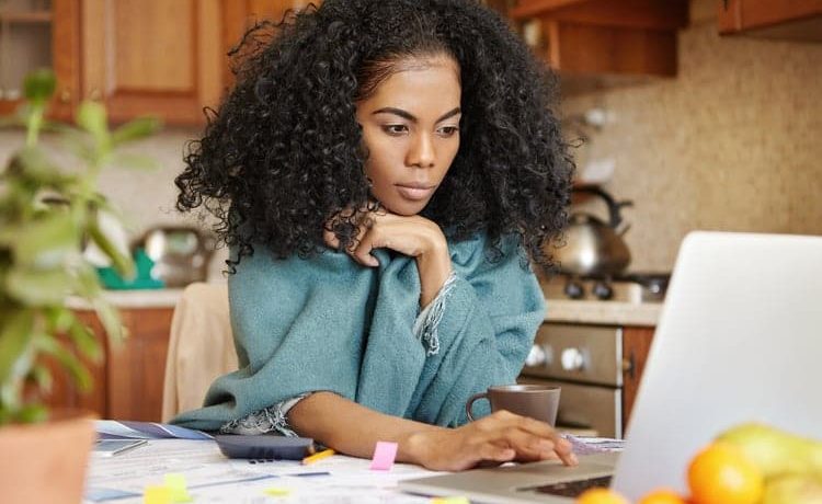 Business Owner Checking Reviews